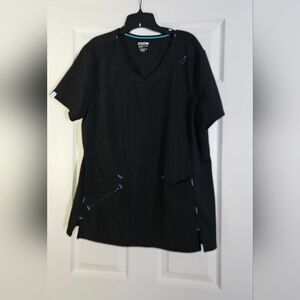 Scrubstar premium performance Scrub Top is a size XL.
